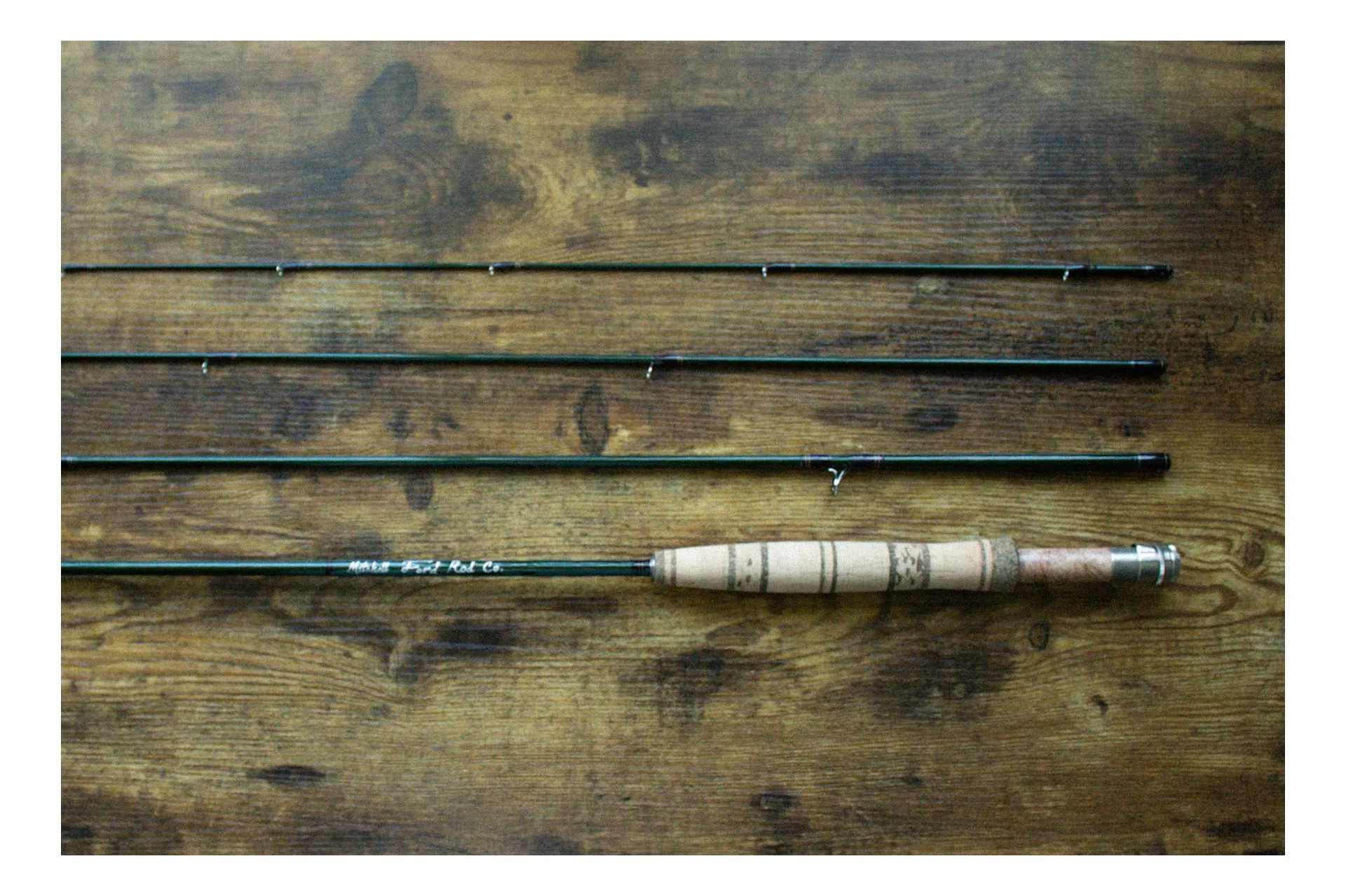 Overhead view of complete rod on wood surface